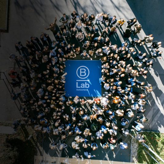 Participants networking at the Swiss Impact Forum, part of the B Ecosystem community events.